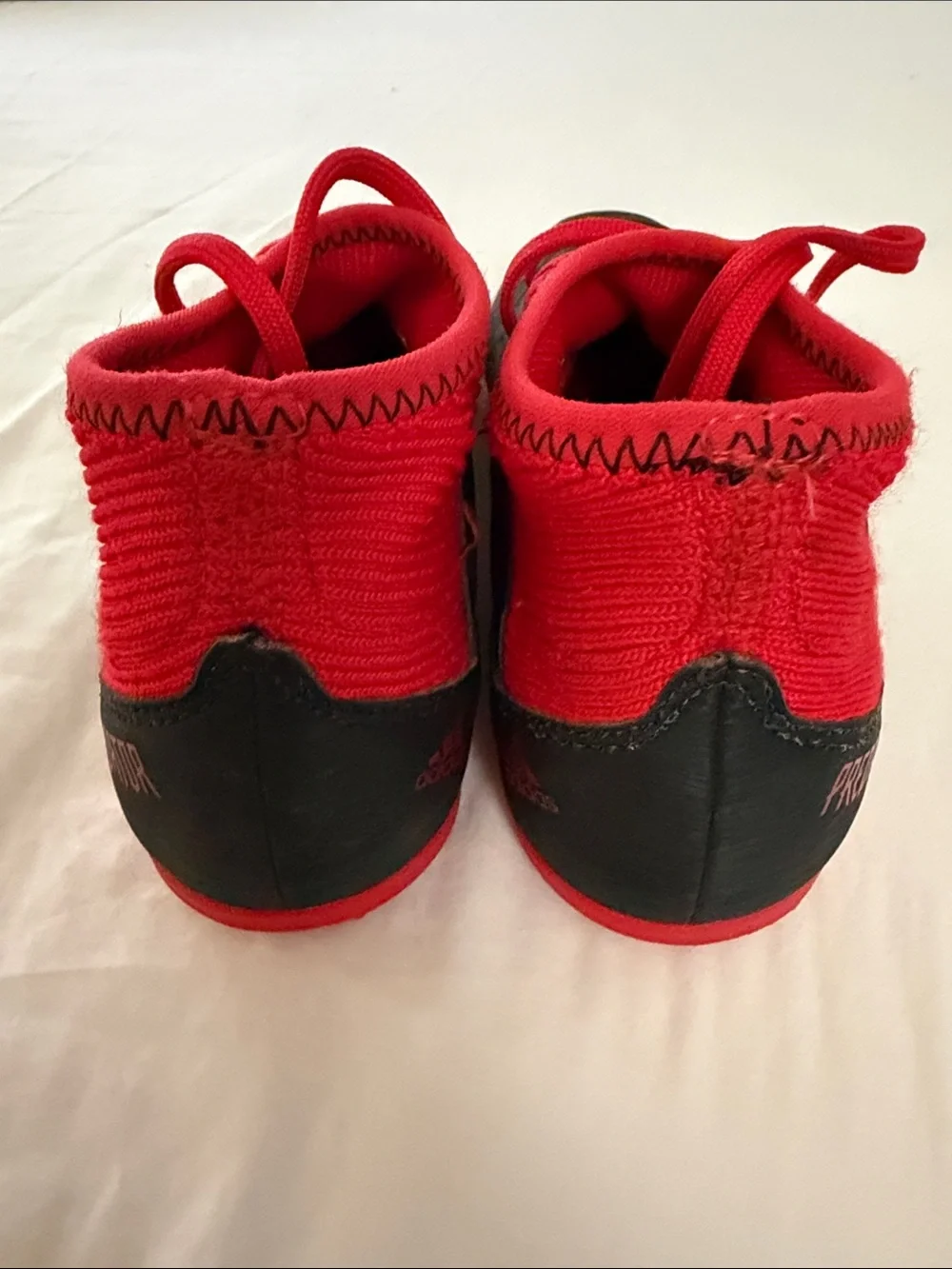 adidas Kids Black and Red Mid-Top Soccer Sneakers